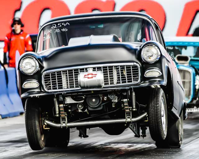 A black car with a chevrolet logo on the front