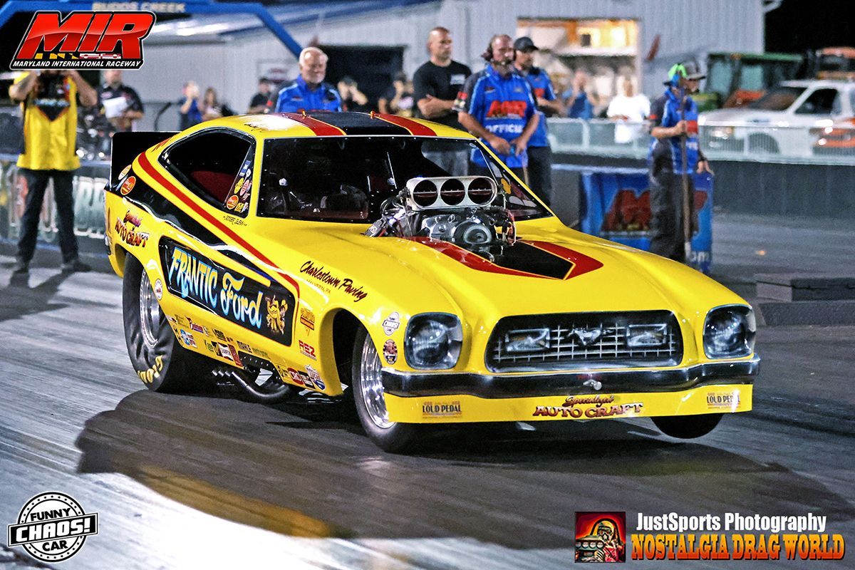 A yellow car with the word power on it