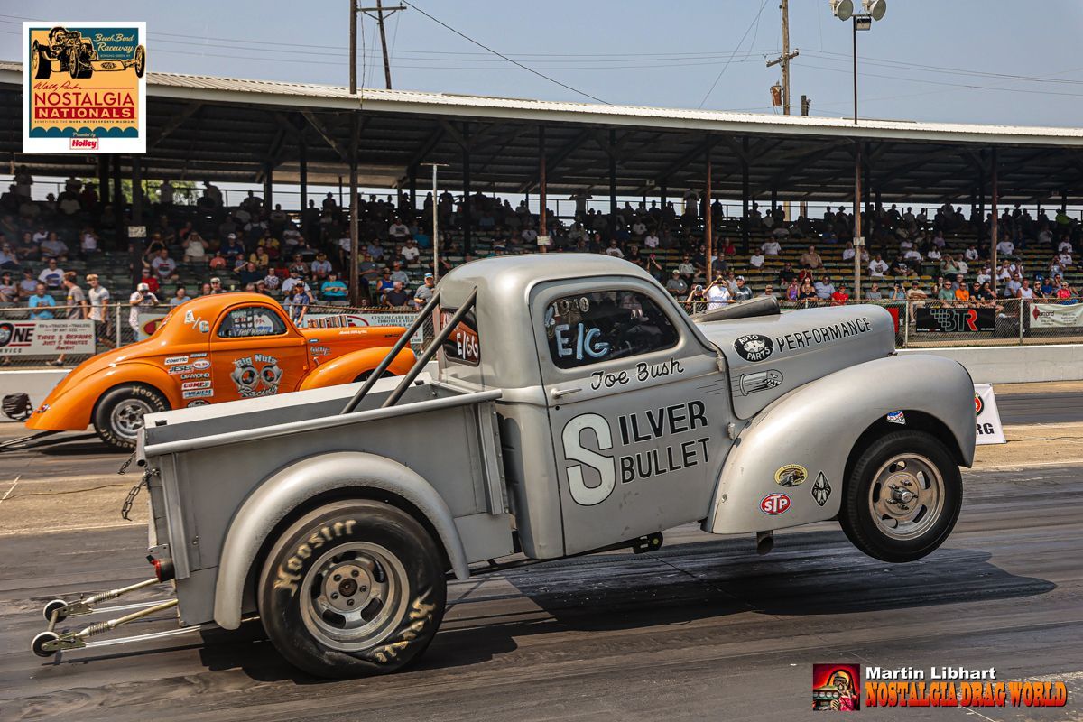 A silver truck with the word silver on it