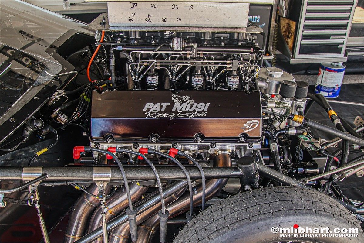 A close up of a pat mosi engine in a car