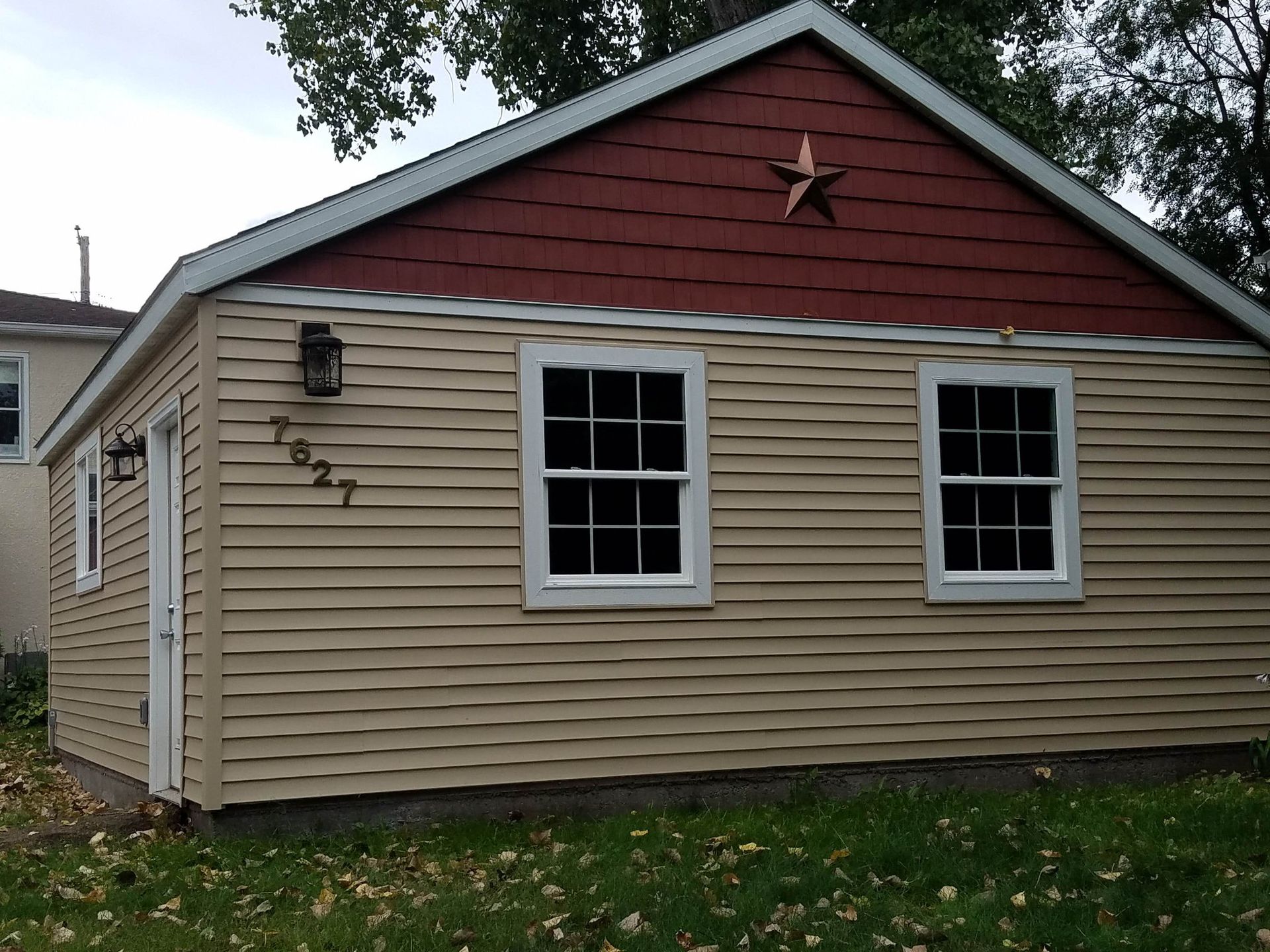 A small house with a star on the roof