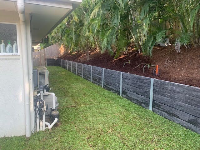 Concrete sleeper retaining wall system installation