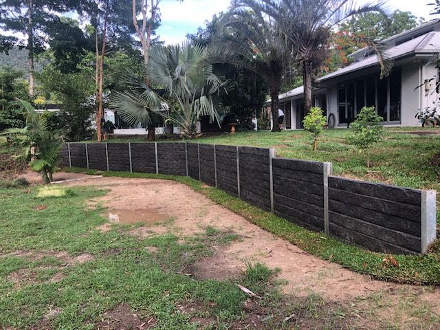 Concrete sleeper retaining wall system installation
