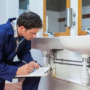 Plumber checking sinks — Plumbing in Pompton Plains, NJ