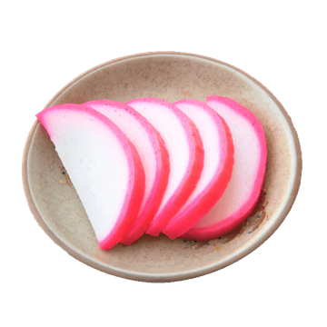 JPOT Japanese hot pot red and white colored sliced fish cake on a beige plate bird's eye view