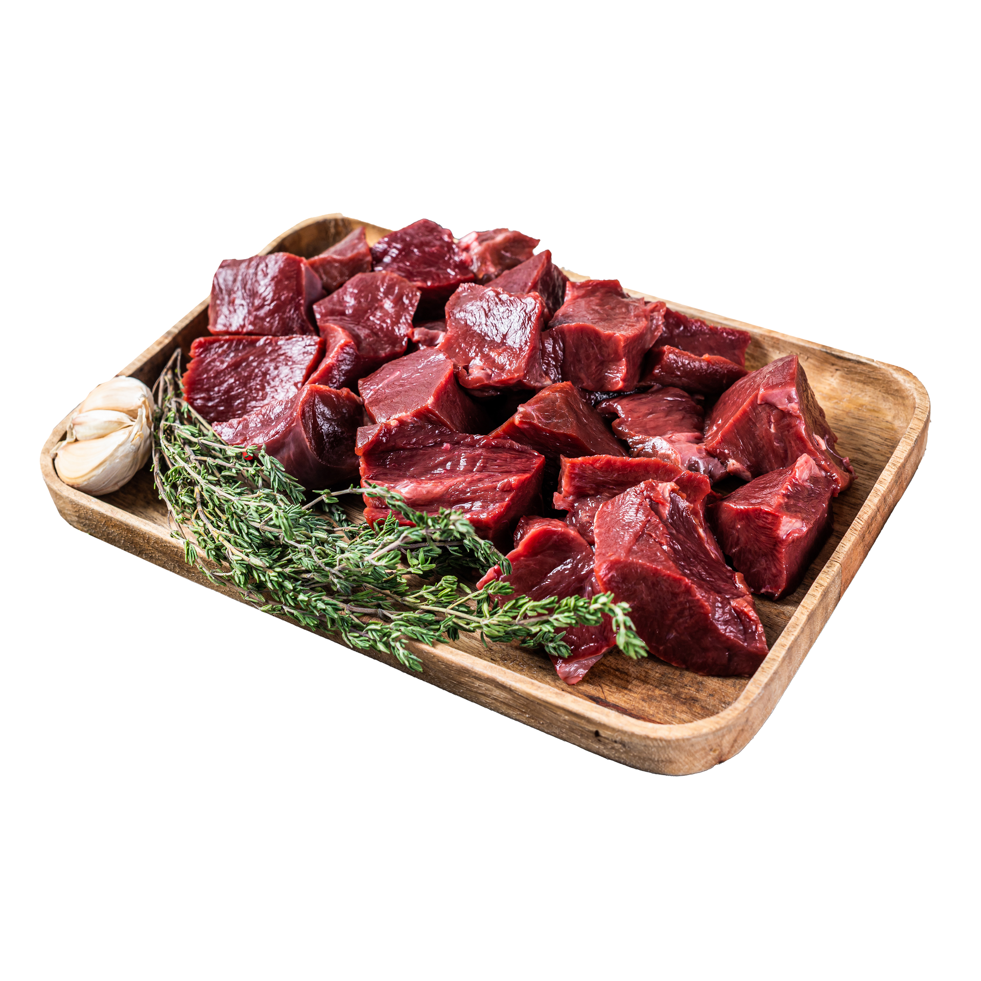 JPOT Japanese BBQ marinated ribeye cubes with garlic and herbs on the side on a wooden serving board angled view