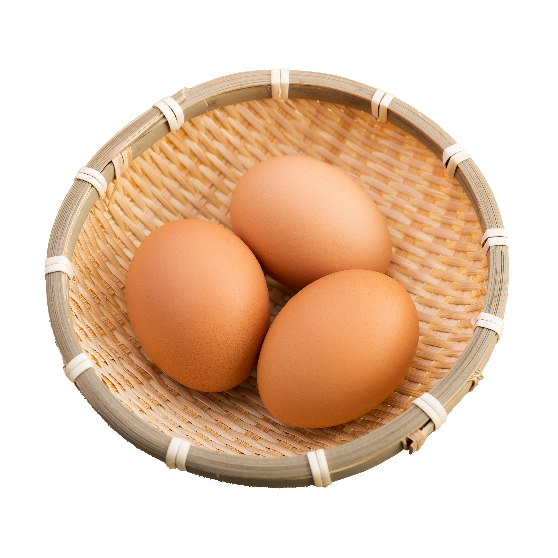 JPOT Japanese hot pot three shelled brown raw eggs in a whicker circular basket bird's eye view