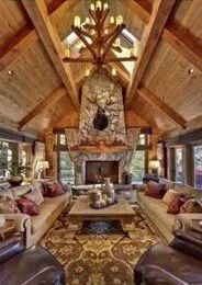 A living room filled with furniture and a fireplace.