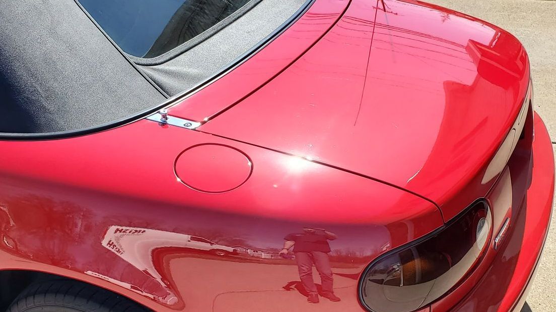 Sunlight reflecting off vehicle after ceramic coating application