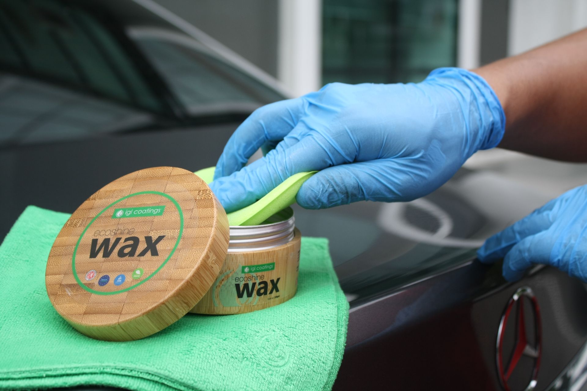 Traditional wax being applied to Mercedes Benz