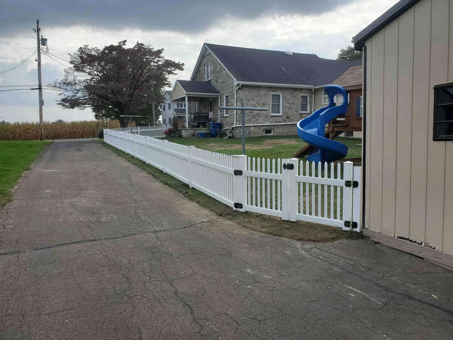 Residential Vinyl Picket Fence — Paradise, PA — Fisher’s Fencing