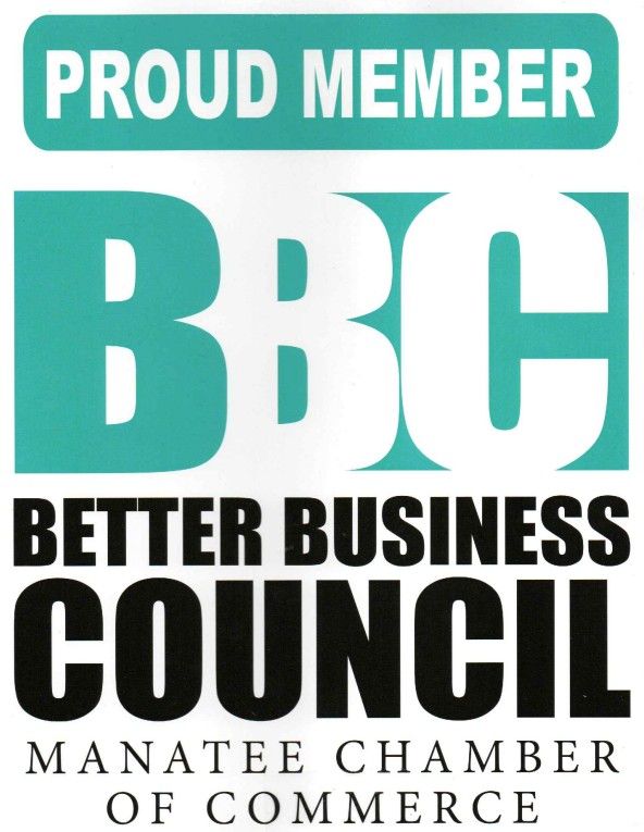 Blue Kia car with Cloud Nine advertising, parked outside a building.