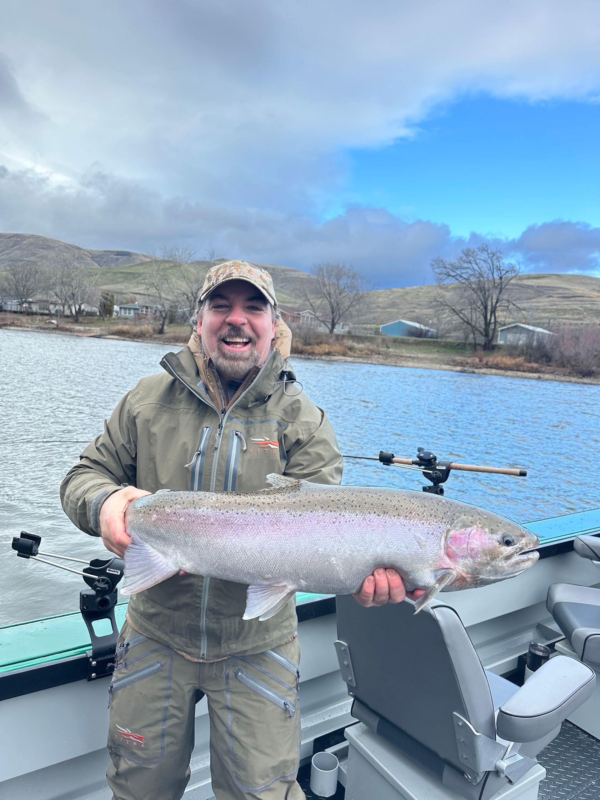 Angler Catching a Salmon on the Clearwater