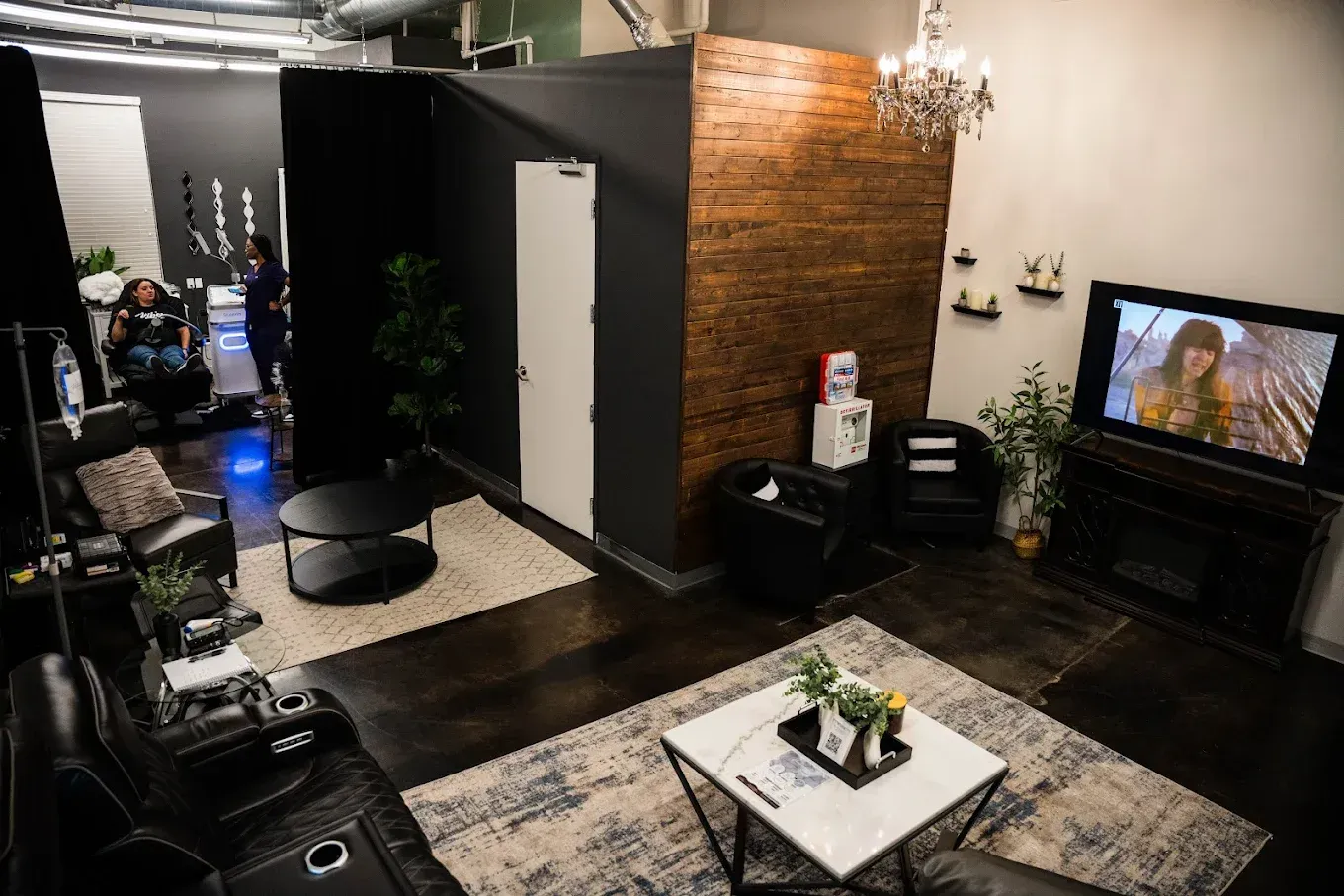 A living room filled with furniture and a flat screen tv.