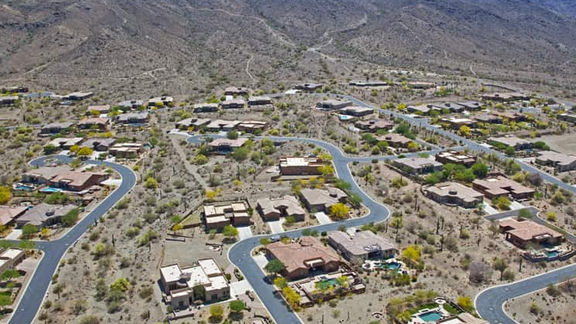 An aerial view of a residential area in the desert