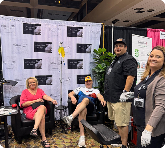 A group of people are posing for a picture in a room