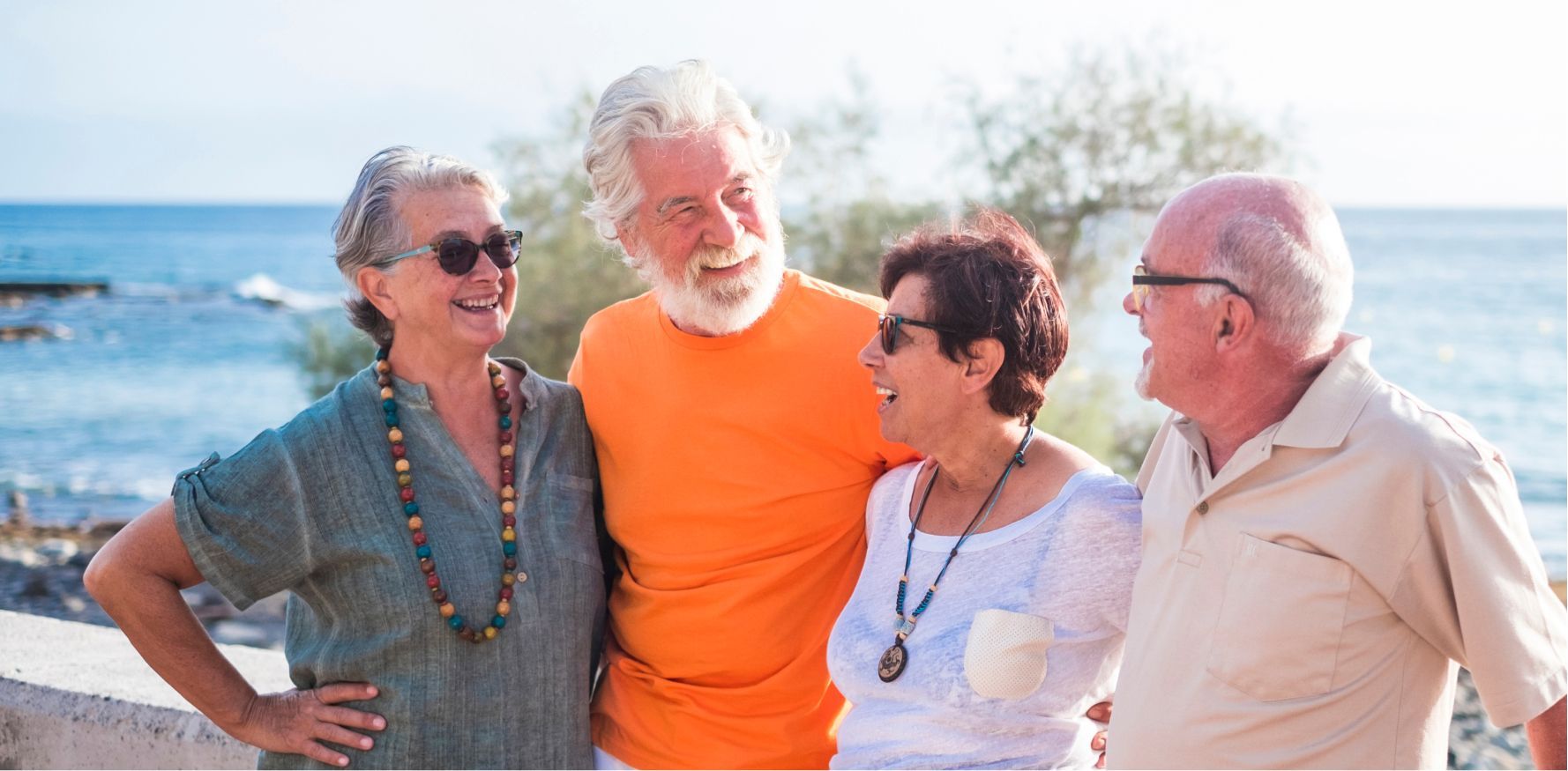 Couple smiling on a boat, holding a camera; 