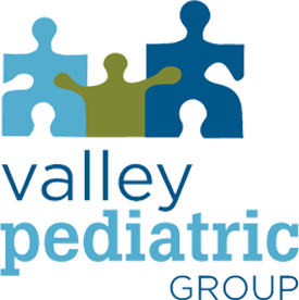 Logo for Valley Pediatric Group with puzzle-piece figures in blue and green.