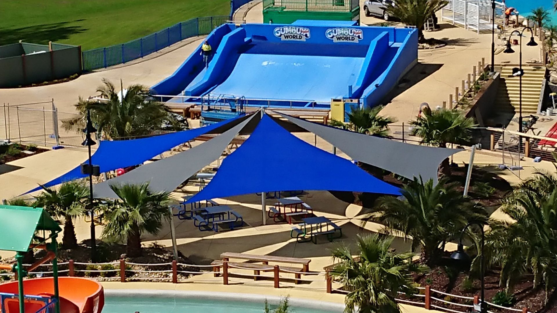Shade Sail Installation in front of the surfs up ride at Gumbuya World Theme Park  | 2705 Princes Hwy, Tynong North VIC 3813 Melbourne | Sundance Shade Structures PTY LTD 