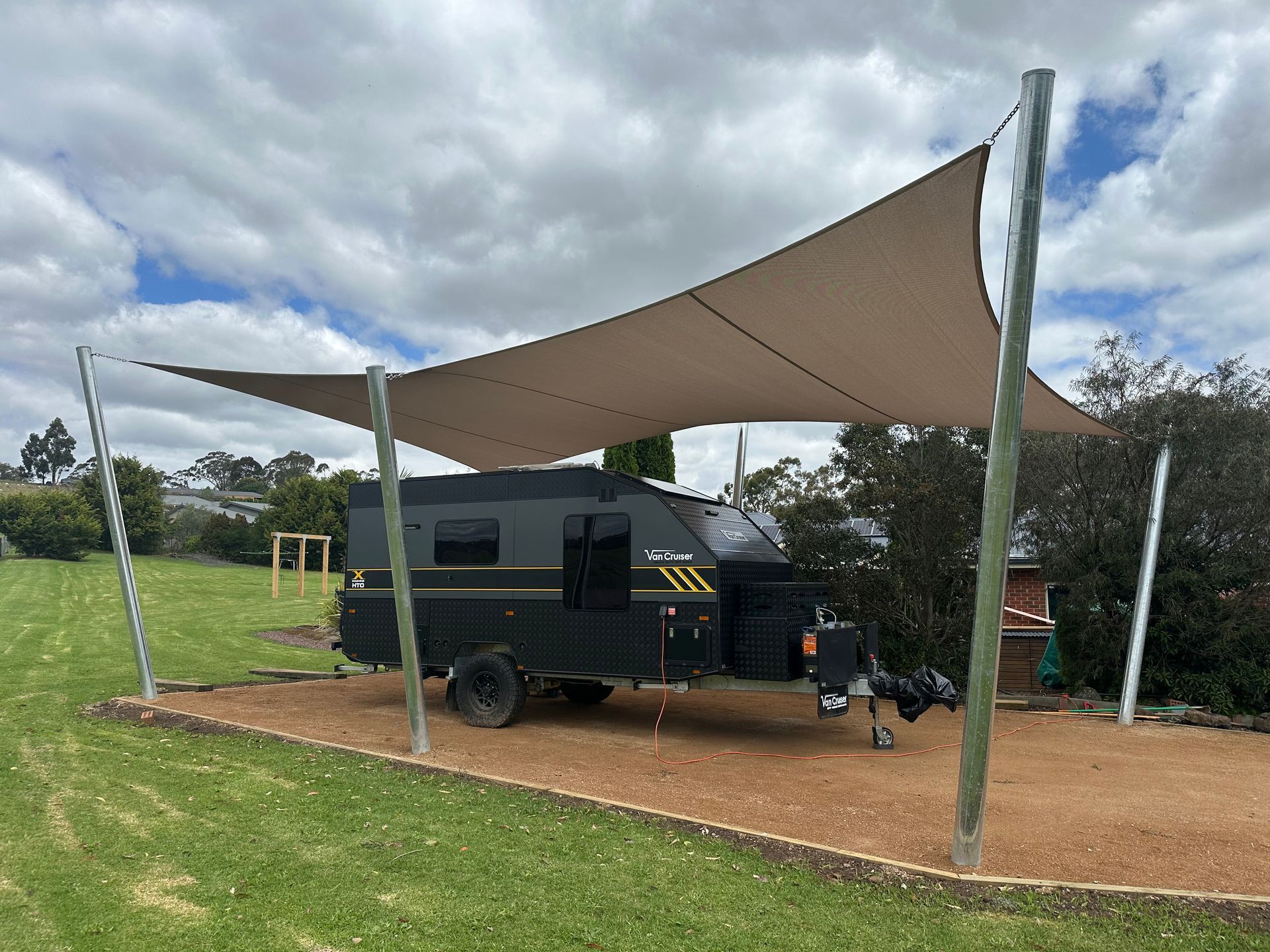 Custom commercial shade sail installation for large caravan carport. Located in Melbourne south east suburbs, shade sail installer 