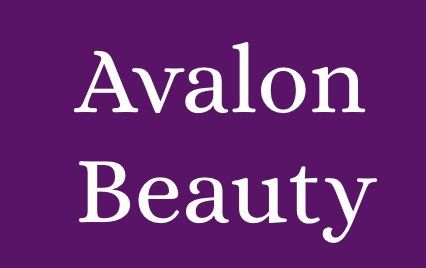 A purple background with white text that says avalon beauty