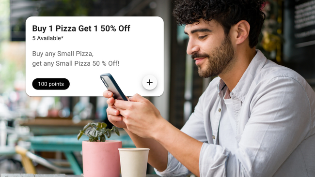 man looking at rewards in Olo Loyalty