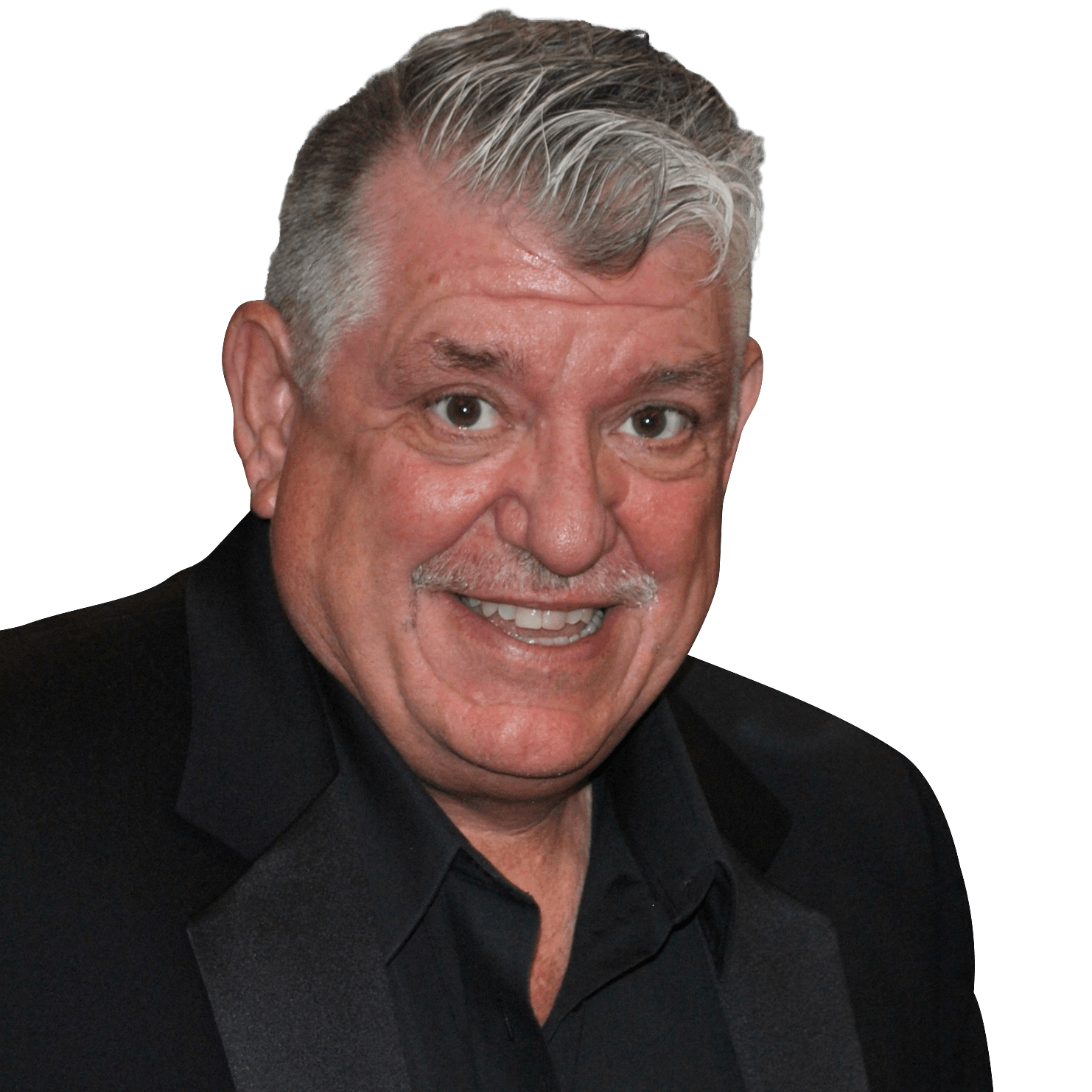 A man with gray hair and a mustache is smiling for the camera