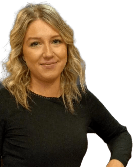 A woman with blonde hair is wearing a black shirt and smiling