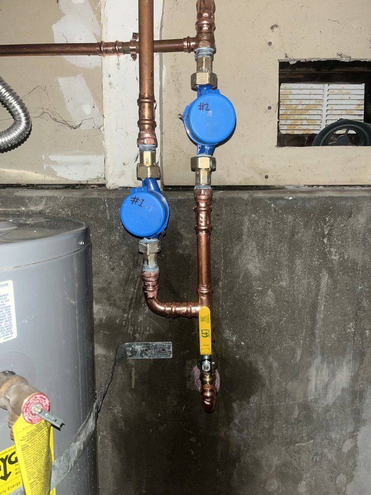 A water meter that has the letter m on it