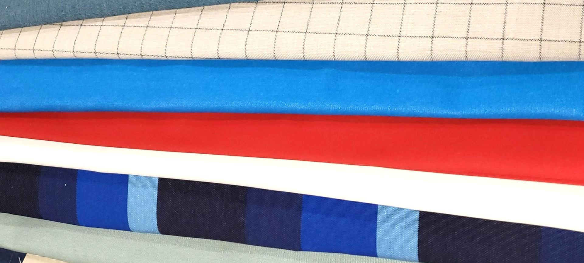 Sunbrella  FABRICS FOLDED AND STACKED TO SHOW COLORS