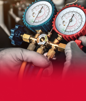 Man performing repair on air conditioner unit for vehicle | Tveten's Auto Clinic