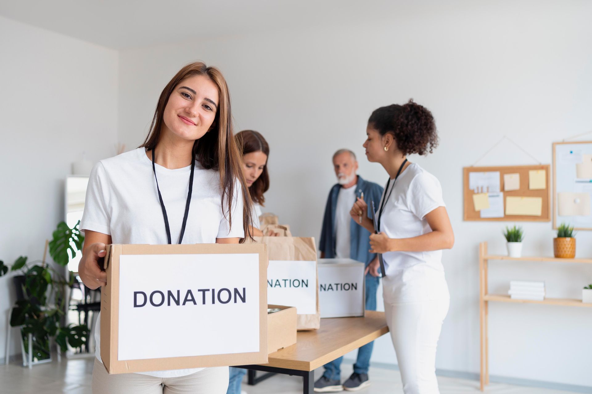 Salon interior: woman getting hair styled near desk with payment system and shelves of colorful products.