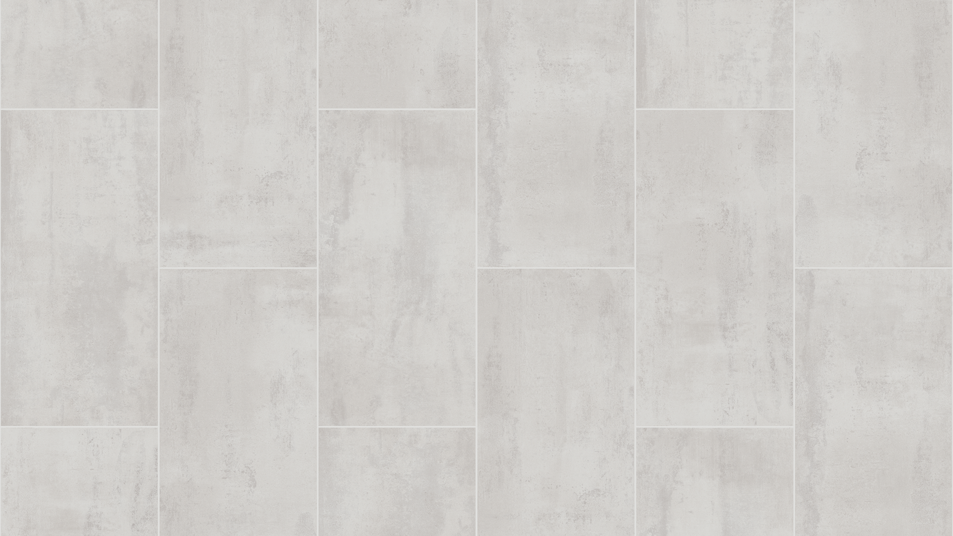Light gray textured rectangular tile flooring.
