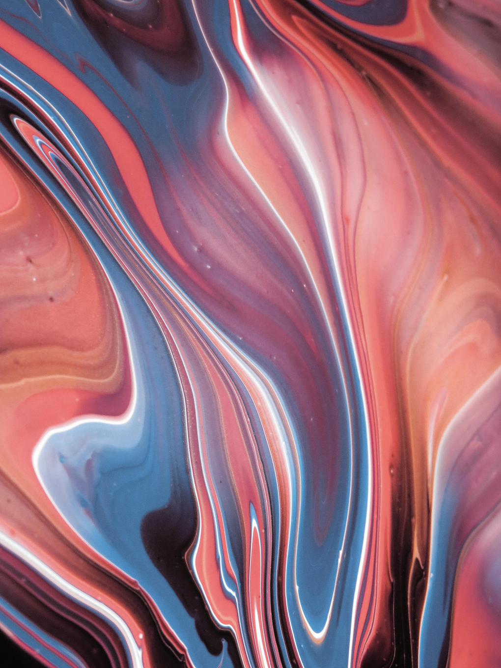 Um close de uma textura de mármore colorida
