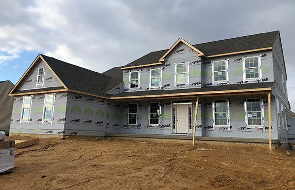 House Siding Under Construction — Millsboro, DE — Alpha Roofing & Siding