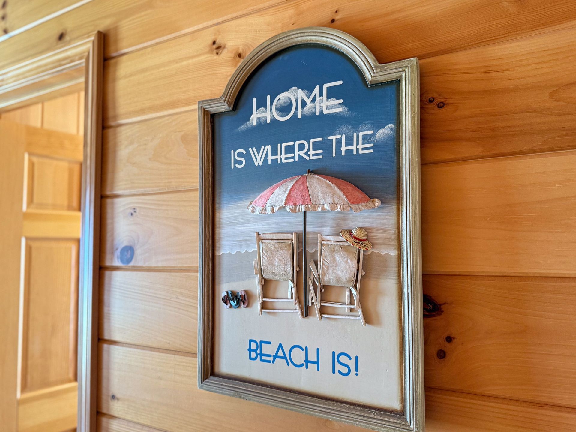 Sign on a wood wall: 