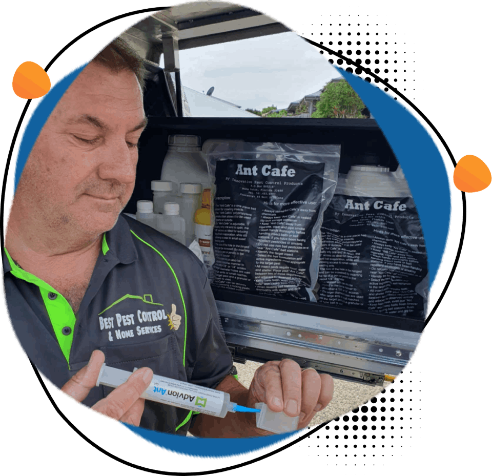 A man is holding a syringe in front of a shelf of ant cafe products.