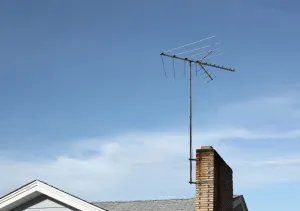 Tv antenna on the roof of the house