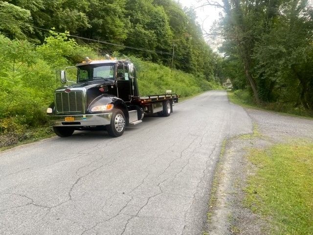 Black Tow Truck — Deposit, NY — Wheeler’s Collision