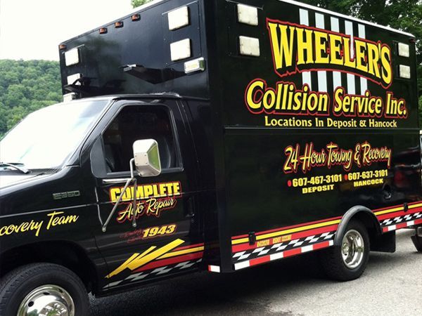 Side View of Black Service Vehicle — Deposit, NY — Wheeler’s Collision
