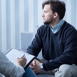 Young man during psychological therapy — Counseling Services in Teaneck, NJ Young man during psychological therapy — Counseling Services in Teaneck, NJ