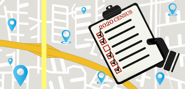 A person is holding a clipboard with a 2020 census on it.