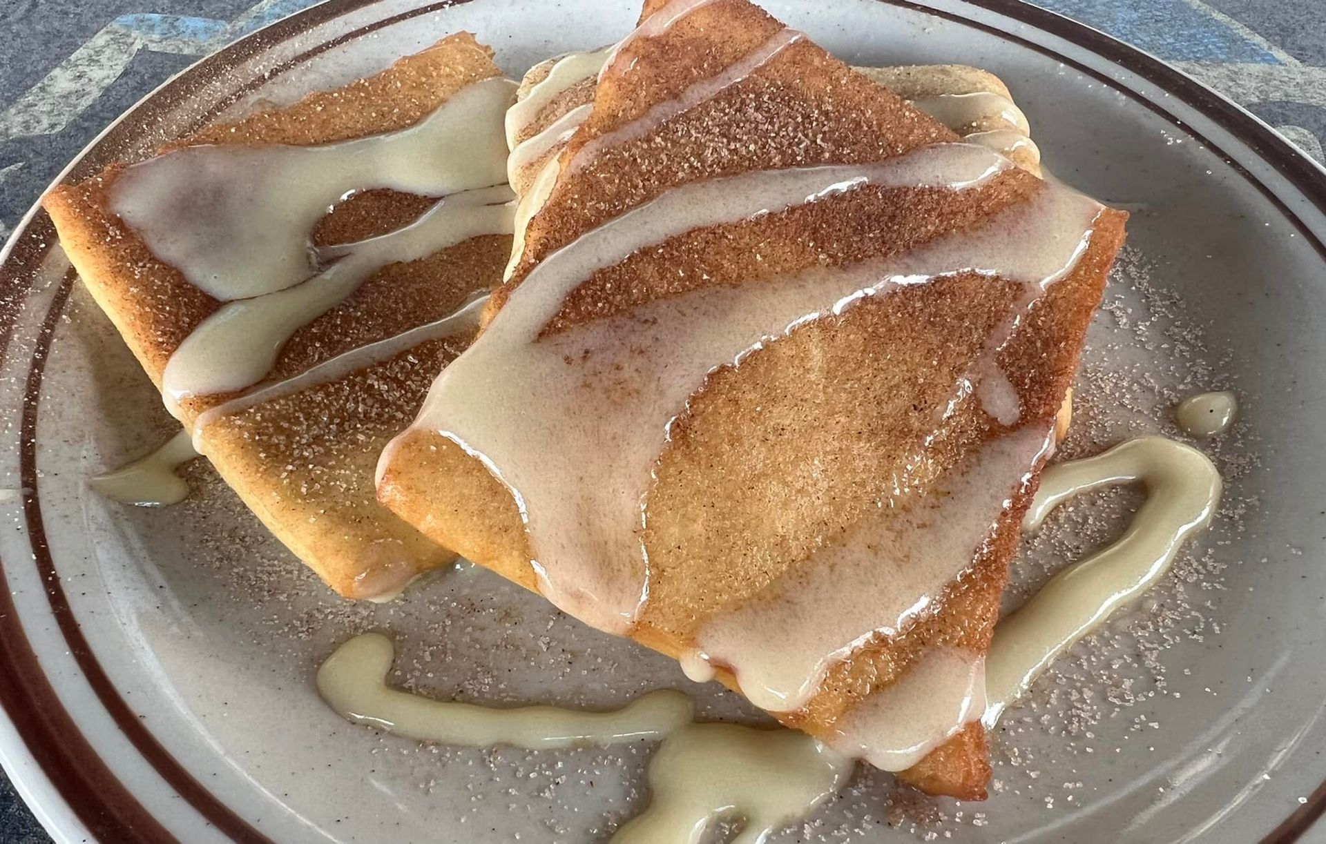 A close up of a plate of food with icing on it