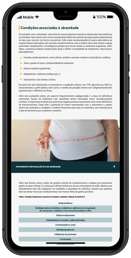 Um tablet e um celular estão um ao lado do outro.