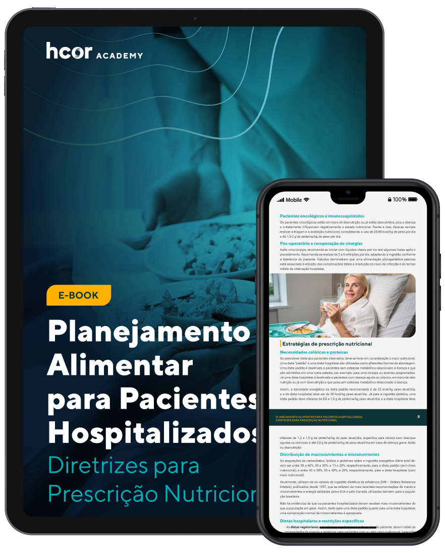 Um tablet e um celular estão um ao lado do outro.