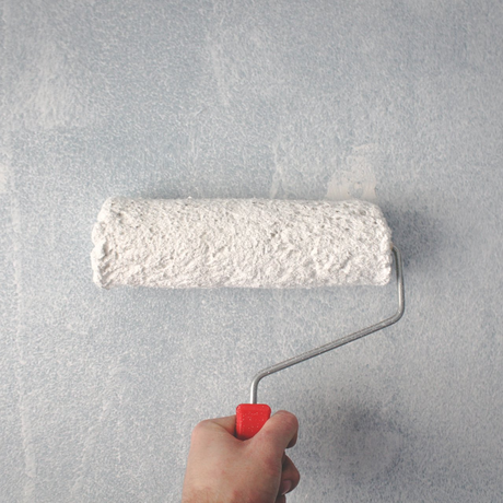 paint roller on wall