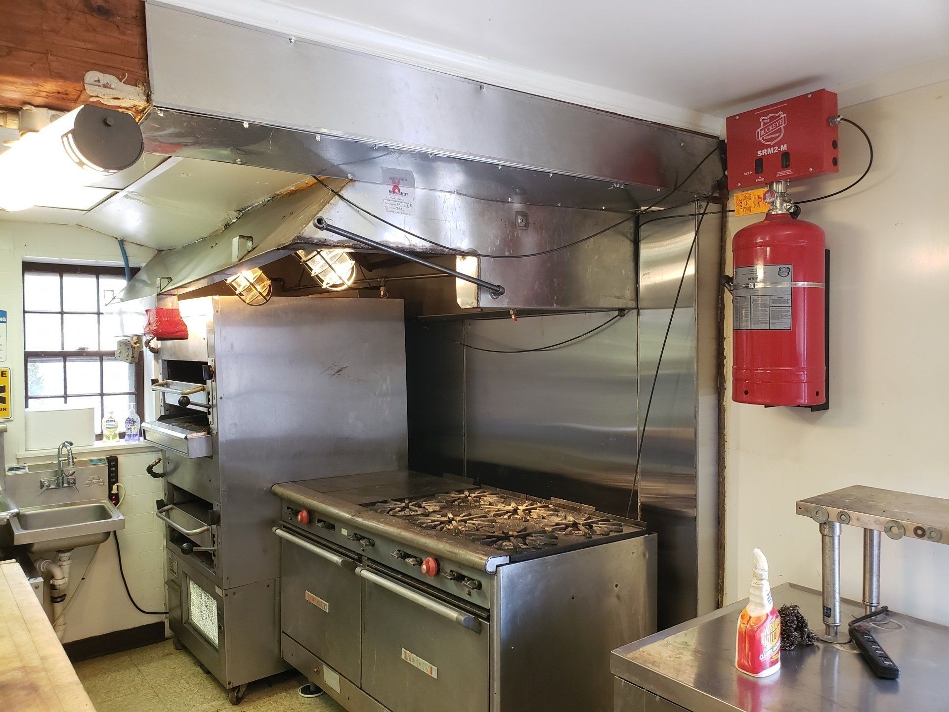 Buckeye Fire Suppression System Installation. Stainless Steel Backsplash Installation in a 200 year old B & B.