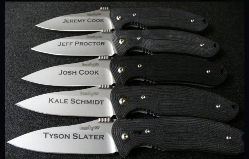 A row of knives with names on them including tyson slater