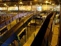 An aerial view of a conveyor belt in a warehouse.