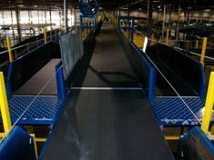 There is a conveyor belt in the middle of the room.